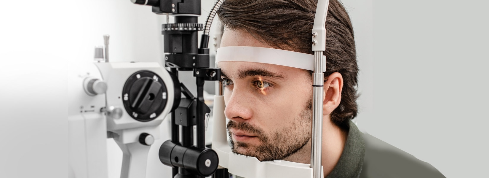 young man during eye exam in Girard